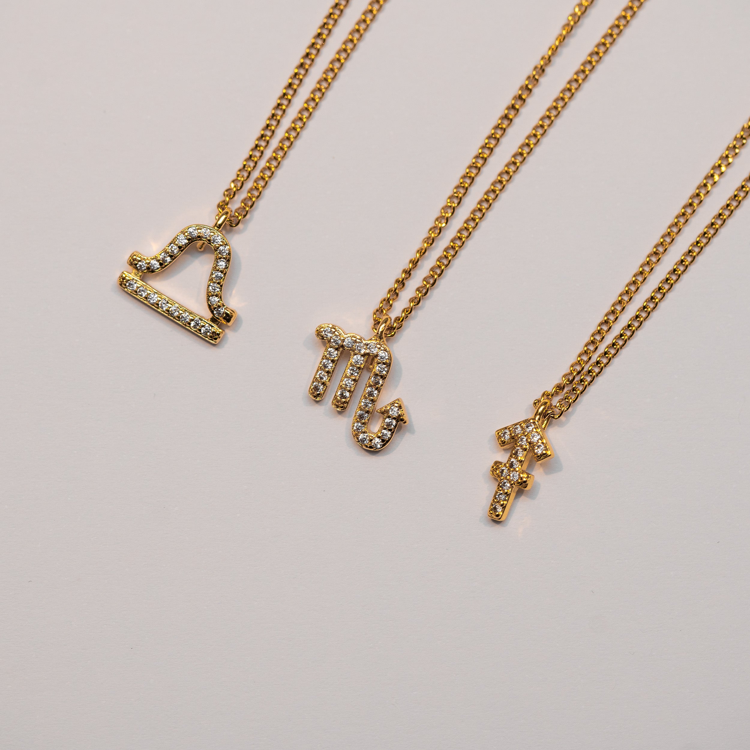 STJERNETEGN HALSKÆDE M. ZIRKONER - GULDBELAGT