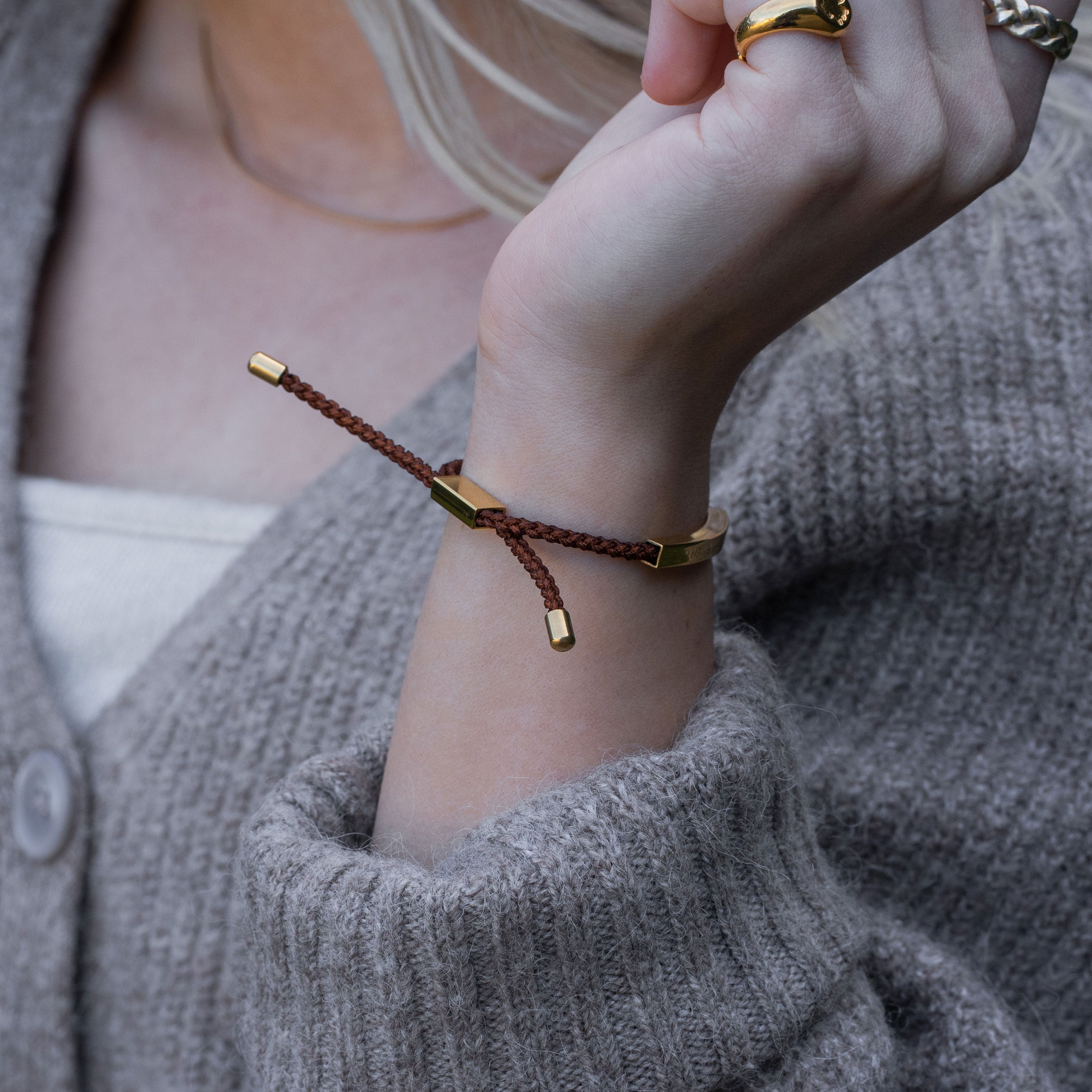 ROPE GULDBELAGT/BRUN